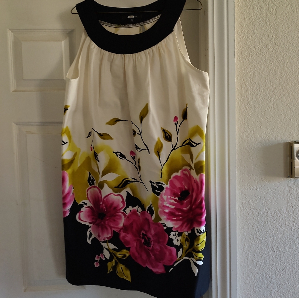 Cute summer dress,  size 14, dress is black, and  white with a floral design.